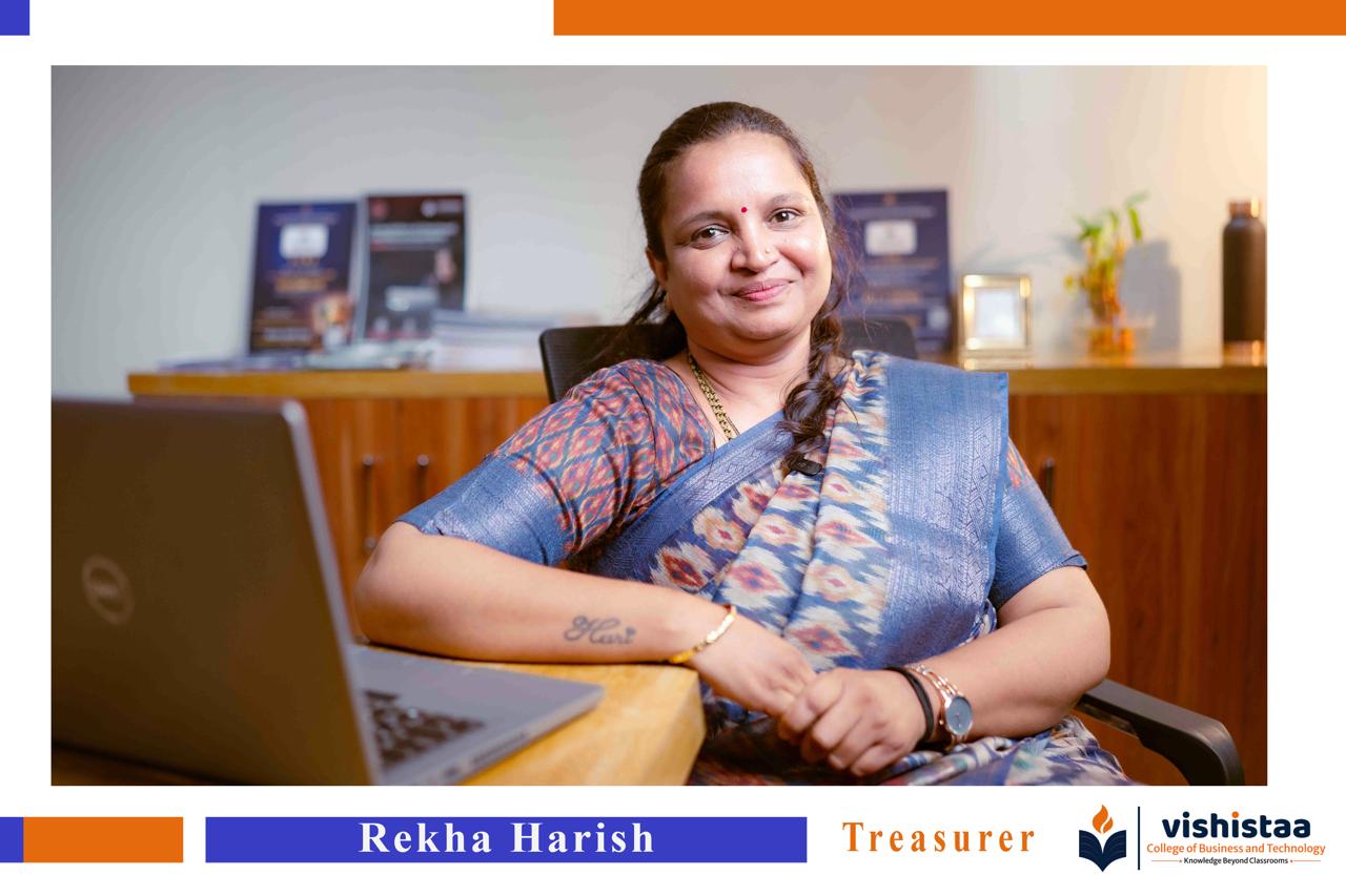 Smt. Rekha — Treasurer
